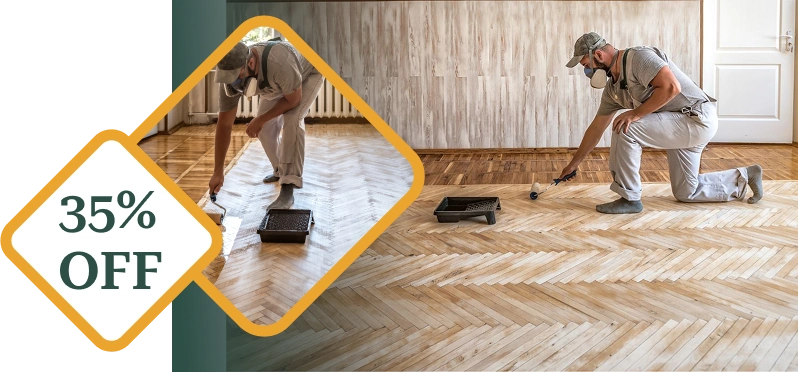 Professional applying polish to a herringbone wood floor, 35% off discount